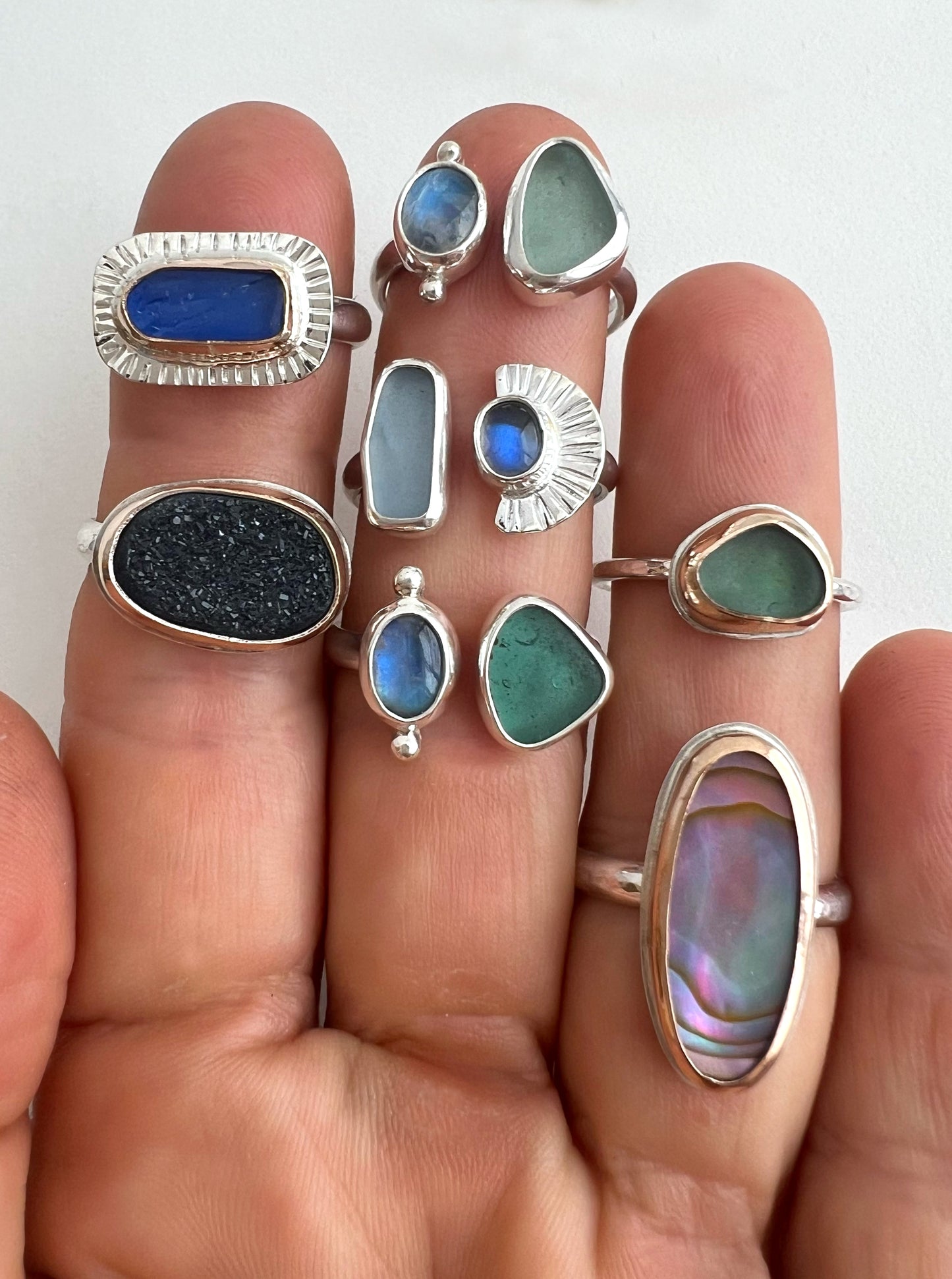 Rings on hand to show scale