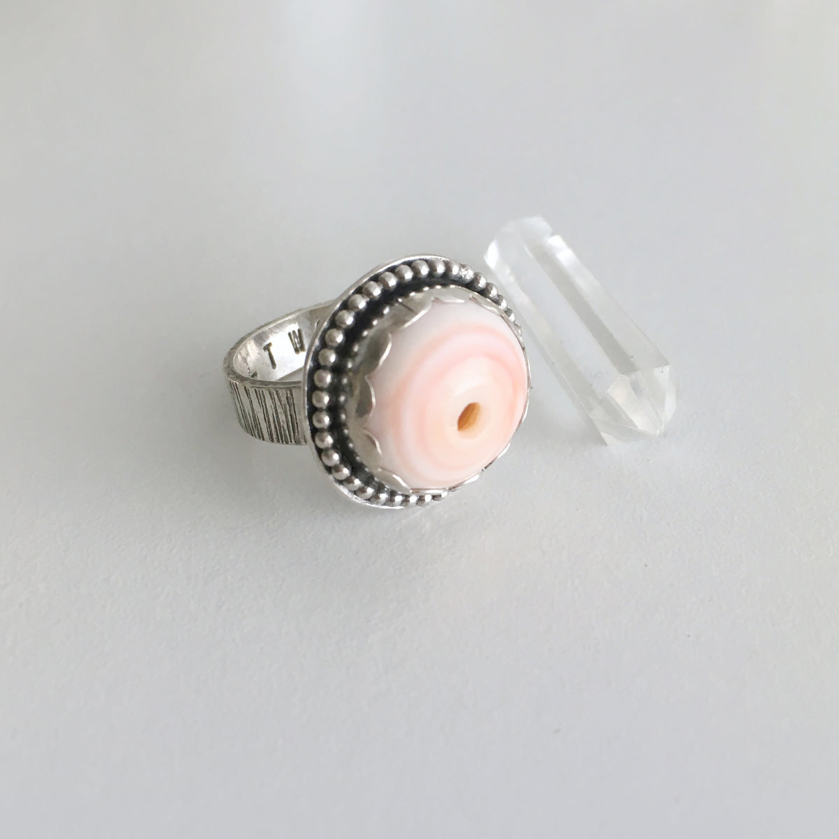 Puka-Shell-Ring-in-Sterling-Silver-with-SALTWATER-Inscription