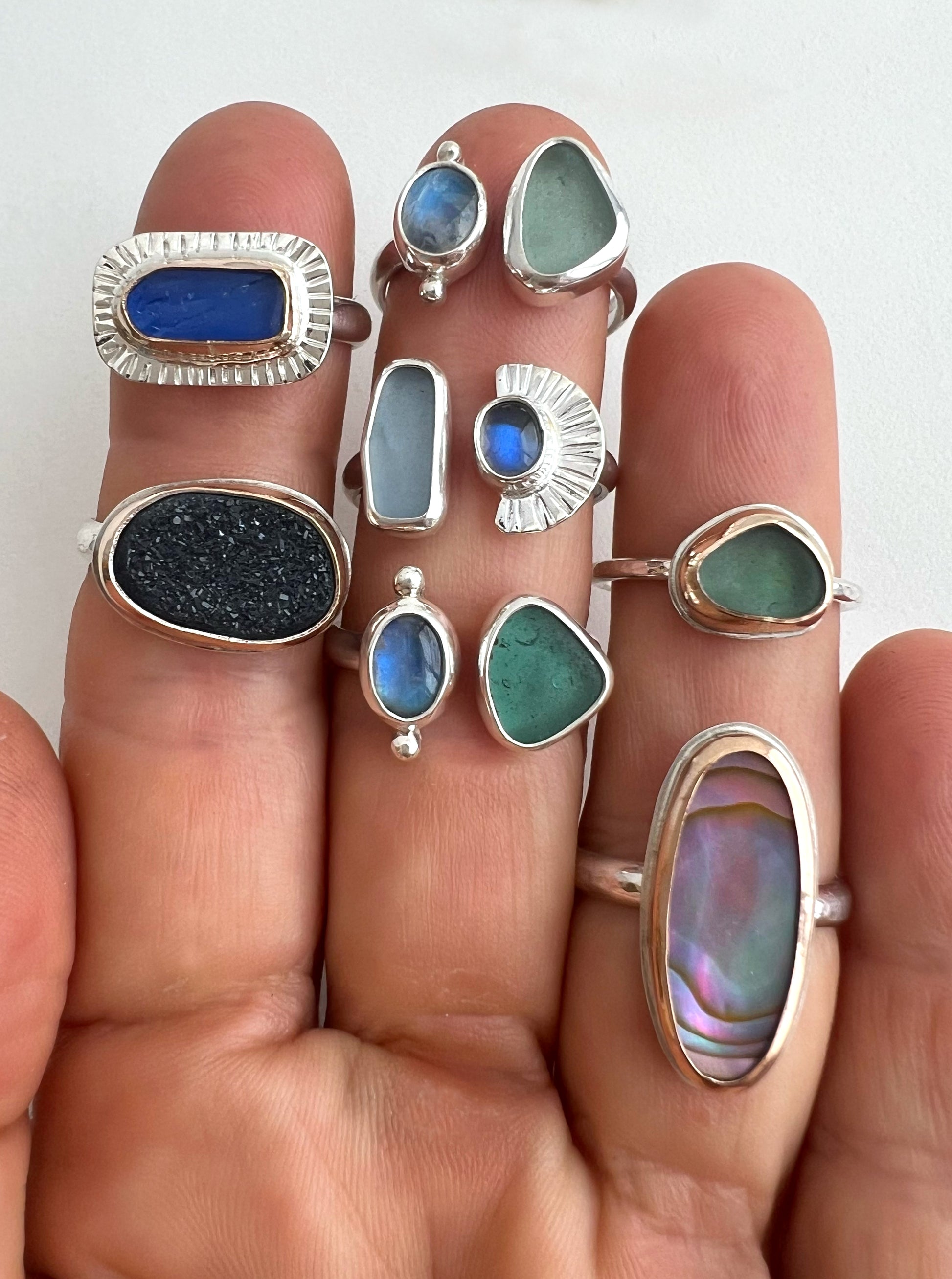 Rings on hand to show scale