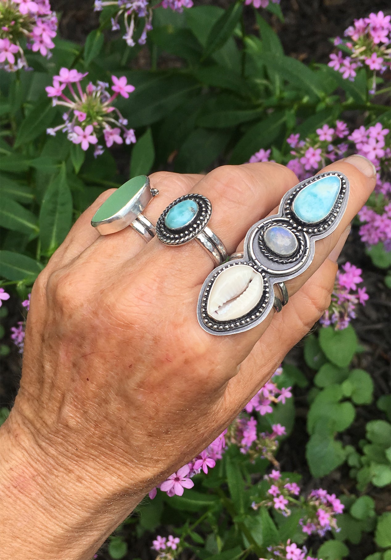 Alchemist Trio Ring with Larimar, Rainbow Moonstone and Cowrie Shell Shown on Hand
