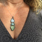 Sirena Trio Pendant with Rainbow Moonstone, Larimar and Natural Sea Glass Shown Being Worn