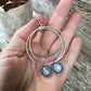 Crescent  Moon Hoops with Rainbow Moonstone Shown in Hand
